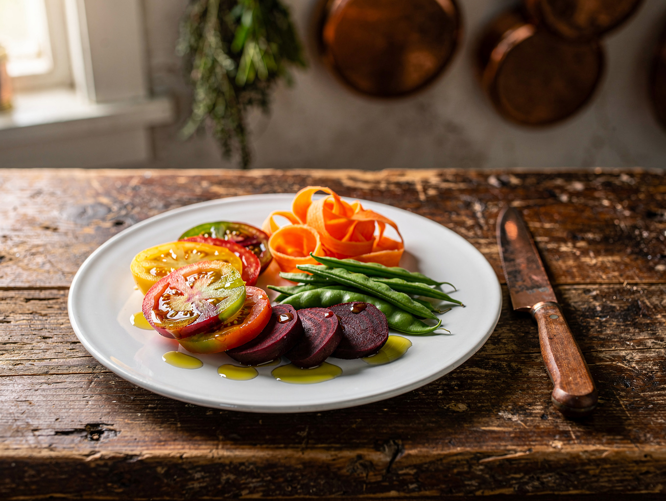 Artistically plated roasted vegetable appetizer with herb dressing